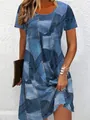 Detail view of a casual short-sleeved dress with faux denim patchwork print. - XL / Dresses / Denim Blue