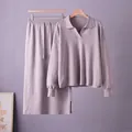 Elegant two-piece knitted set with polo collar sweater and midi skirt in dusty purple. - One Size / Top And Bottom / Khaki