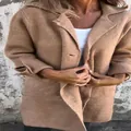 Close-up of khaki lapel cardigan featuring single-breasted buttons and pockets - S / Tops / Khaki