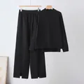 Sophisticated black women's loose knit sweater and split-hem wide-leg pants two-piece set - One Size / Top And Bottom / Black