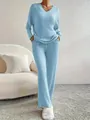 Elegant lichtblauw geribbeld lounge-set met top met V-hals en bijpassende broek - S / Lichtblauw