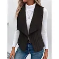 Women's chic black sleeveless vest featuring a cozy sherpa collar and ribbed knit texture. - S / Tops / Black