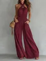 Detail view of the bohemian backless sleeveless wide-leg jumpsuit with waist smocking - S / Dresses / Rouge Red