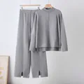 Grey knit two-piece set featuring long sleeve sweater and wide-leg pants with slits - One Size / Top And Bottom / Dark Gray