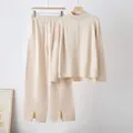 Elegant beige knit loungewear set featuring wide-leg slit pants and a loose sweater. - One Size / Top And Bottom / Apricot