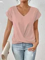 Elegant women's pink short sleeve V-neck top featuring a unique twisted hem detail - S / Tops / Lotus Pink
