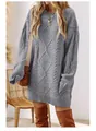 Detail view of a grey cable-knit sweater dress showing its oversized fit and cozy style - Gray
