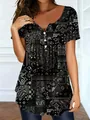Detailed view of elegant paisley print and button neckline on women's casual loose top - Black