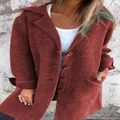 Close-up of a women's rust brown wool-like cardigan with single-breasted lapel design - Burgundy