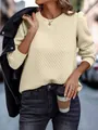 Detail of cream quilted sweatshirt featuring elegant puff sleeves and textured diamond pattern - S / Tops / Apricot