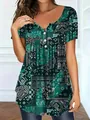Close-up of an elegant green paisley print on a V-neck loose top with button detail. - 1XL / Tops / Dark Green