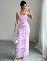 Vue détaillée d'une robe longue élégante à imprimé floral rose violet et coupe ajustée - S / Bas / Violet