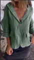 Detail eines übergroßen grünen Leinenblazers für Damen mit einem klassischen Reverskragen - Grün