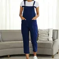 Front view of navy blue casual overalls jumpsuit in a bright living room setting - S / Jumpsuits / Dark Blue