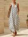 Abito vintage senza maniche con scollo a V, pois blu, tasche e orlo a palloncino - Taglia S / Vestiti / Bianco
