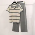 Detail view of the striped polo neck top and matching high-waist knit pants - One Size / Top And Bottom / Gray