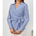 Elegant blue vertical striped long-sleeve blouse with stylish side-tie bow detail - S / Tops / Blue