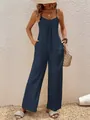 Tuta blu scuro con spalline sottili, gamba larga e scollo a V per le vacanze estive - Blu navy