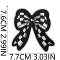Detail view of checkered bow embroidery patch with dimensions 7.6cm and 7.7cm clearly marked - Checkerboard Bow (X26LB-19-12) / 1 Piece / Black and White