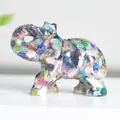 Figura de elefante de resina transparente con piedras de cristal naturales de colores. - Ojo de Gato Colorido