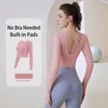 Seamless long sleeve yoga top with built-in chest padding in Barbie pink color - S / Tops / Hot Pink