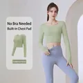 Professional long sleeve nutmeg green yoga top with built-in chest pads for women - S / Tops / Cardamom Green
