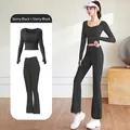 Conjunto de yoga negro de dos piezas con top corto de manga larga y pantalones acampanados - S / Top Y Pantalón / Negro Estrellado + Negro Estrellado