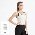 Ribbed athletic crop tank top in apricot color featuring black trim and padding - S / Tops / Apricot