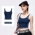 Brassière de sport bleu marine à liseré blanc, haut de fitness élastique avec col en U pour femme - Bleu Baleine