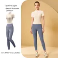 High-stretch women's gym set featuring ivory zip-up short sleeve top and slate blue leggings. - S / Top And Bottom / Ivory White + Grey Lake Blue