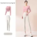 Set fitness yoga due pezzi con crop top rosa Barbie a maniche lunghe e leggings bianco avorio - Taglia S / Top E Pantaloni / Rosa Barbie + Bianco Avorio