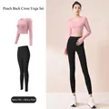 Set yoga due pezzi rosa e nero con crop top a maniche lunghe e leggings a vita alta. - Taglia S / Top E Pantaloni / Rosa E Nero
