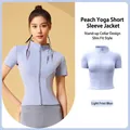 Women's slim fit short-sleeved yoga jacket with stand collar in light frost blue color - S / Tops / Light Frost Blue