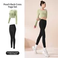 Set yoga slim fit con top a maniche lunghe imbottito e leggings neri in verde cardamomo - Taglia S / Top E Pantaloni / Verde Cardamomo + Nero Stellato