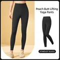 High-waisted black yoga leggings for women featuring a slimming nude-feel fabric - S / Bottoms / Starry Black