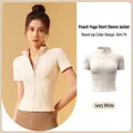 Slim fit ivory yoga jacket featuring a stand collar and front zipper with short sleeves - S / Tops / Ivory