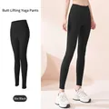 Leggings da yoga a vita alta nero stellare con effetto push-up glutei a pesca - Taglia S / Pantaloni e gonne / Nero brillante