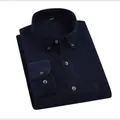 Men's vintage navy blue corduroy long-sleeved shirt featuring decorative floral buttons - 38/S / Tops / Navy Blue