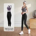 Two-piece yoga set featuring purple sports bra and black high waist leggings for fitness - Plum + Starry Black