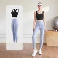 Premium two-piece yoga set featuring black sports bra and grey-blue high waist leggings. - Starry Black + Grey Lake Blue
