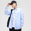 Lichtblauw denim-stijl overhemd met lange mouwen en dubbele zakken voor heren in de lente - 39/M / Tops / Lichtblauw