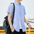 Camicia Oxford casual a maniche corte celeste da uomo in stile giapponese minimalista - 38/S / Top / Azzurro