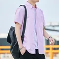 Chemise décontractée à manches courtes en Oxford rose pour homme style été chic - Rose
