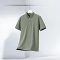 Hochwertiges, atmungsaktives Herren-Polohemd in elegantem Salbeigrün für den Sommer. - M(170/88A) / Oberteile / Armeegrün