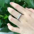 Elegant 925 sterling silver ring featuring five moissanite stones in a row on a hand. - Size 18 (US 8) / 5 Stones Row Ring (0.2ct per) RM3018