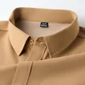 Detail of khaki men's fleece-lined cotton shirt collar with visible warm lining - M / Tops / Khaki