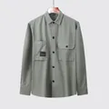 Men's casual sage green long-sleeved shirt featuring double chest pockets and wood hanger - M / Tops / Light Green