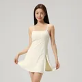 Elegant cream white sports tennis dress featuring thin spaghetti straps and a side slit - S / Dresses / Cream Apricot