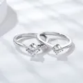 Classic four-prong moissanite engagement rings in 0.5ct and 1ct sizes on white background - Size 18 (US 8) / 0.5 ct