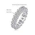 Detail of moissanite eternity ring with 3x5mm oval cut stones in 925 silver. - US Size 5 / 3*5mm Oval